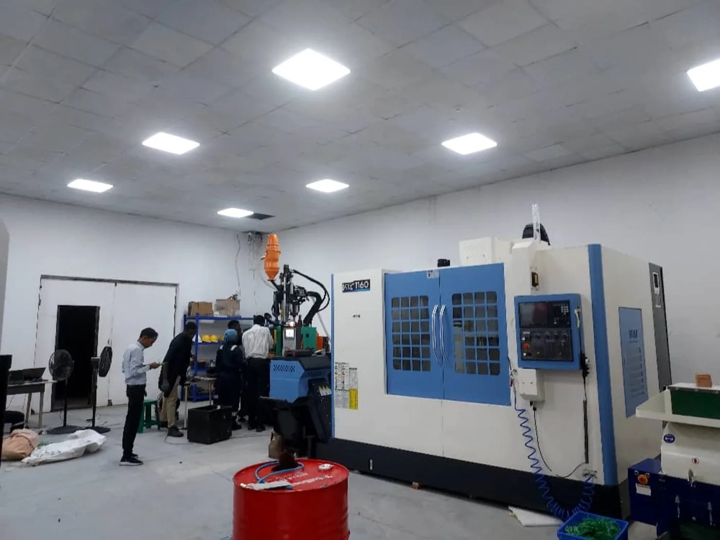 AmalTech engineers working on the mixed production line